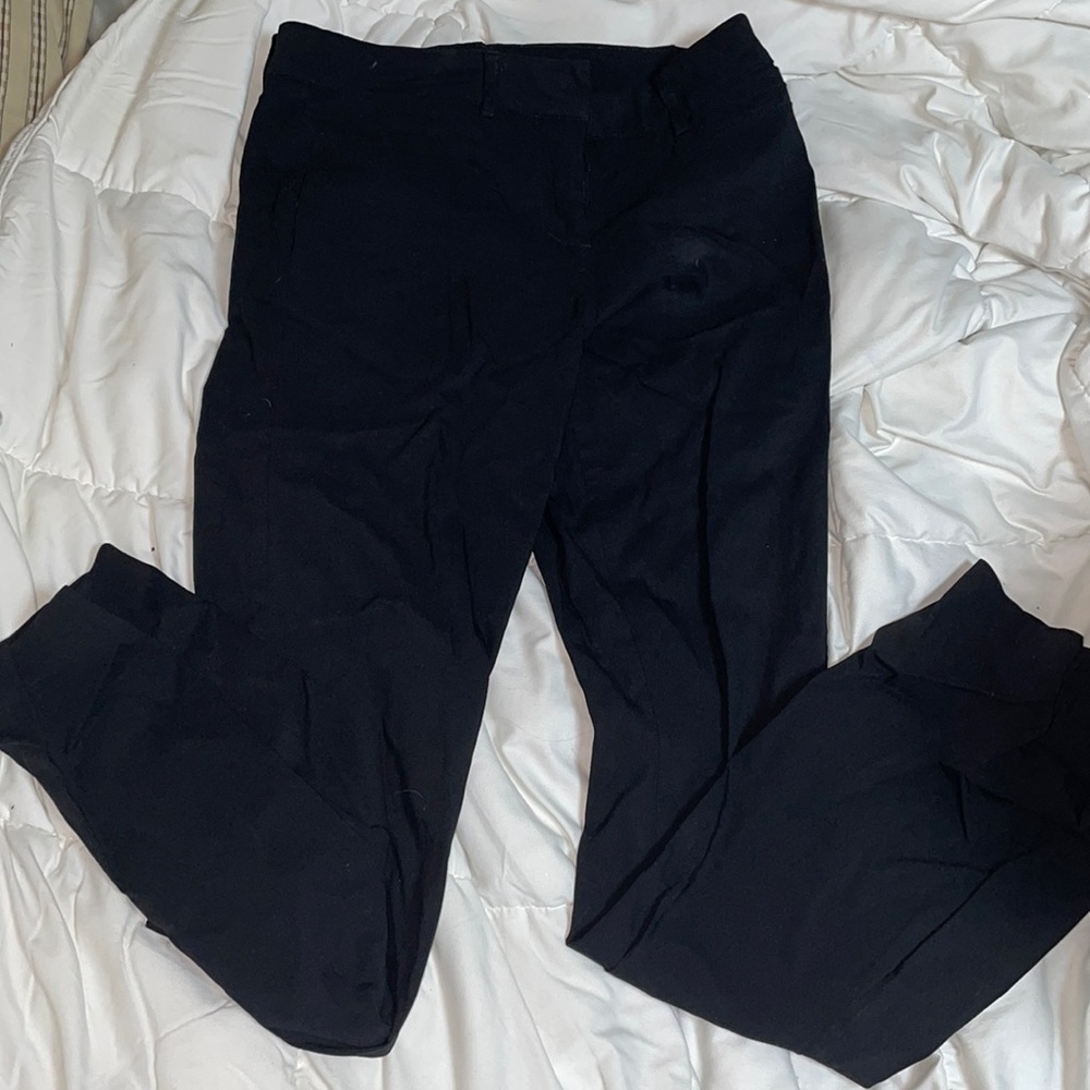 Black form fitting slacks Size: 3/4